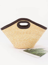 Stylish Straw Beach Bag with dark handles, perfect for summer outings and market trips.