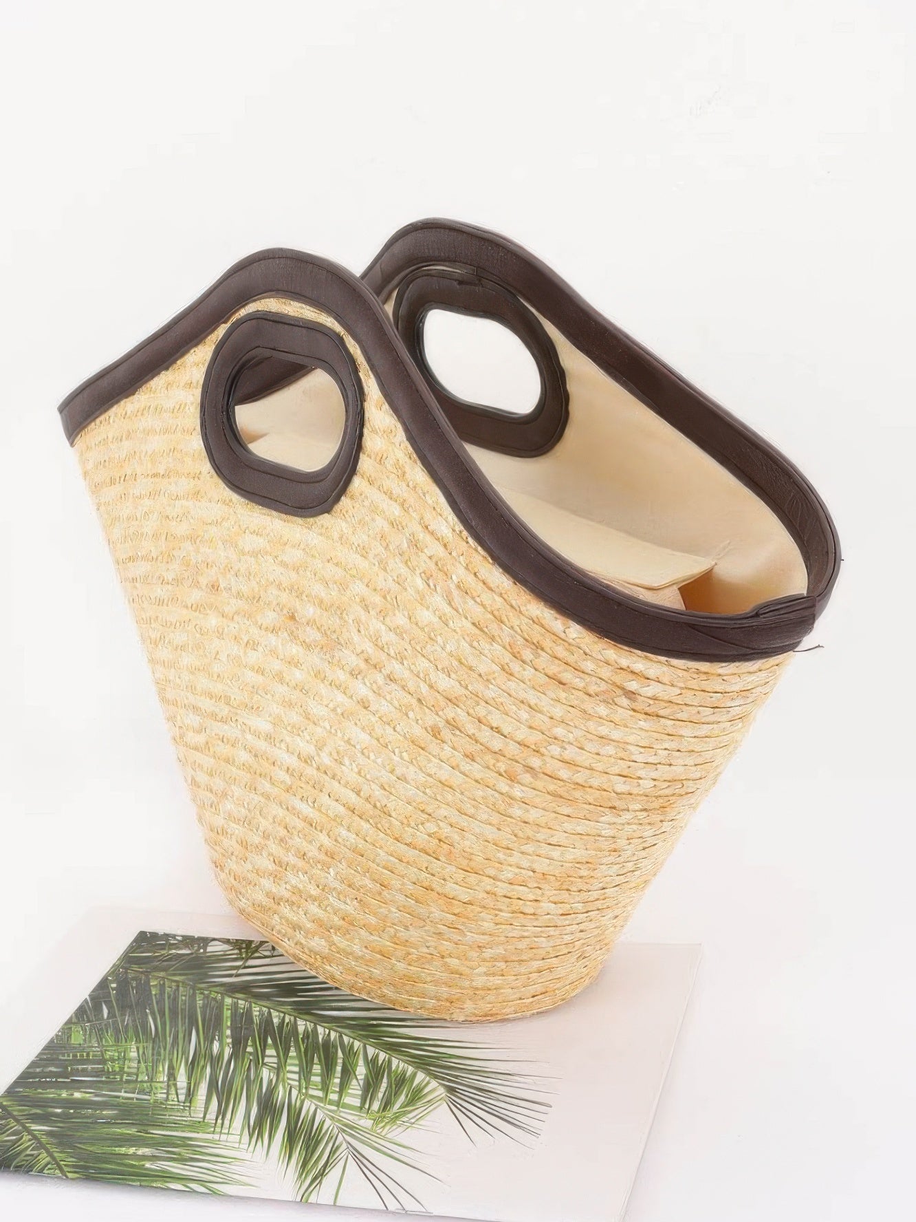 Stylish Straw Beach Bag with a woven texture and sturdy handles, perfect for summer outings.