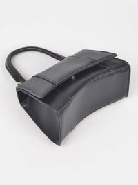 Faux Leather Top Handle Bag showcasing a sleek design and smooth finish, perfect for everyday use.