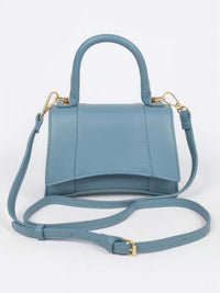 Faux Leather Top Handle Bag in a stylish blue color, showcasing its sleek design and versatility for everyday use.