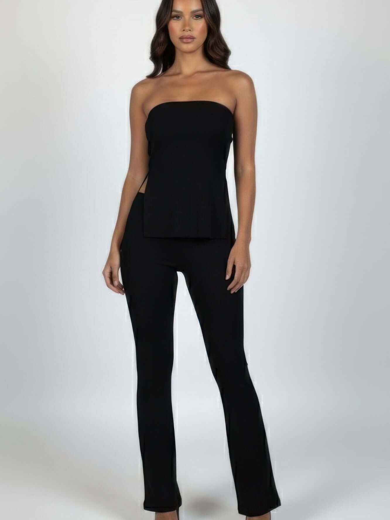 Ribbed Slit Tube Top & High-waist Flare Pants Set worn by a model, showcasing a sleek and modern outfit.