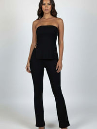 Ribbed Slit Tube Top & High-waist Flare Pants Set worn by a model, showcasing a sleek and modern outfit.