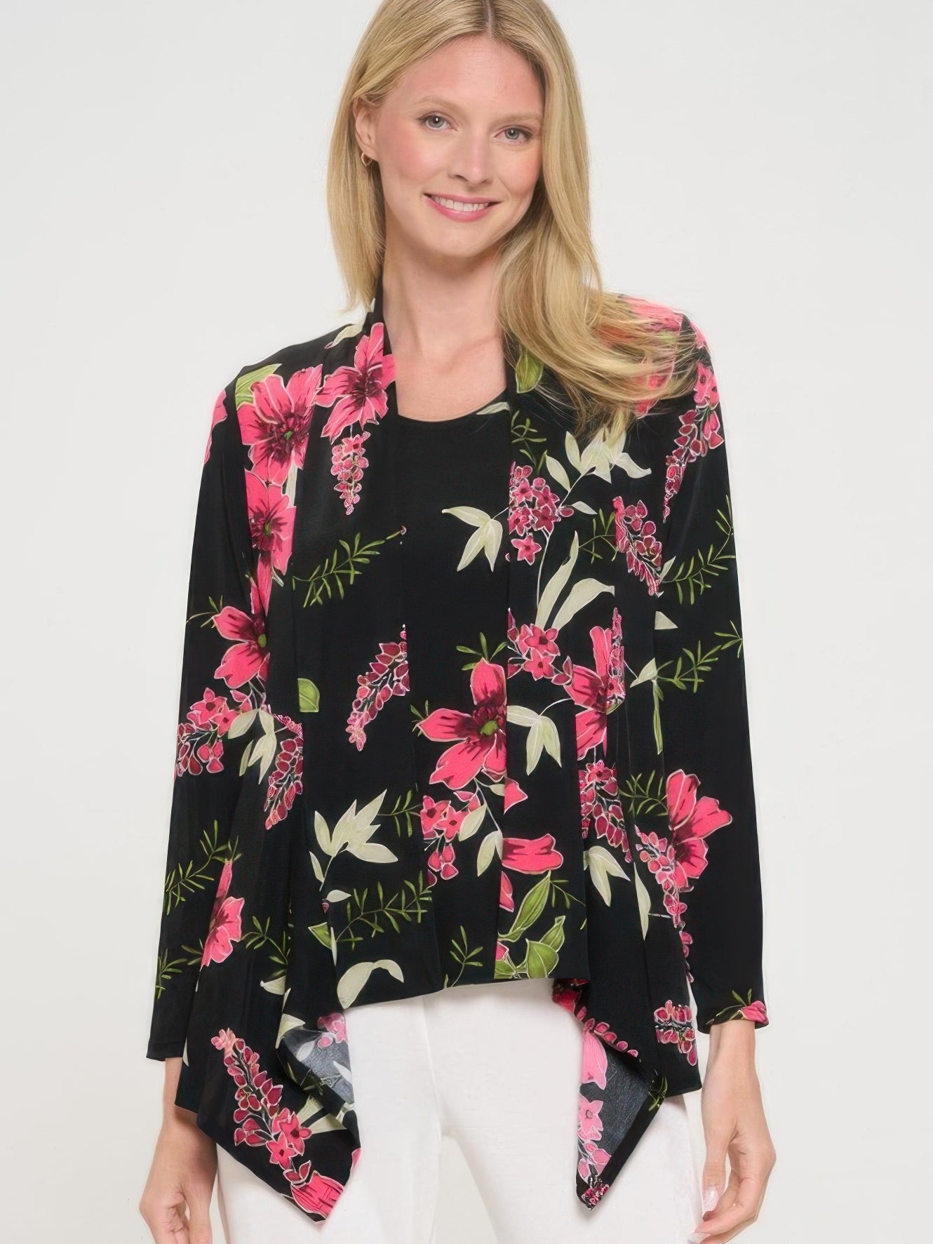 BNS mid cut jacket featuring an elegant floral print, designed for modern layering and comfort, worn by a smiling model.