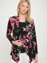 Woman wearing a BNS mid cut jacket with a floral print and draped silhouette, perfect for stylish layering.