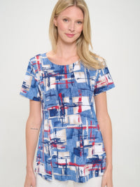 HIT Round Neck Short Sleeve Slit Top in blue and white abstract pattern, featuring subtle slits and a flattering silhouette.