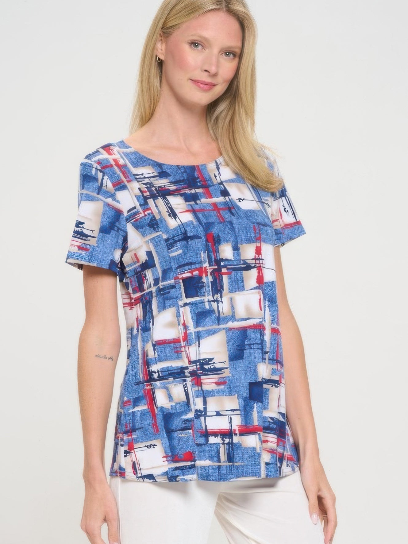 HIT Round Neck Short Sleeve Slit Top with abstract blue and white design, perfect for casual outings.