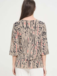 Back view of the Print Hit Merrow Top featuring a stylish pattern and comfortable fit.