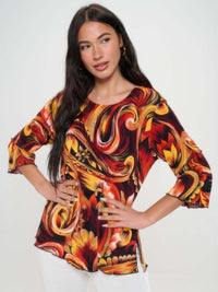 Print Quarter Sleeve Top featuring vibrant patterns and quarter-length sleeves for a stylish everyday look.