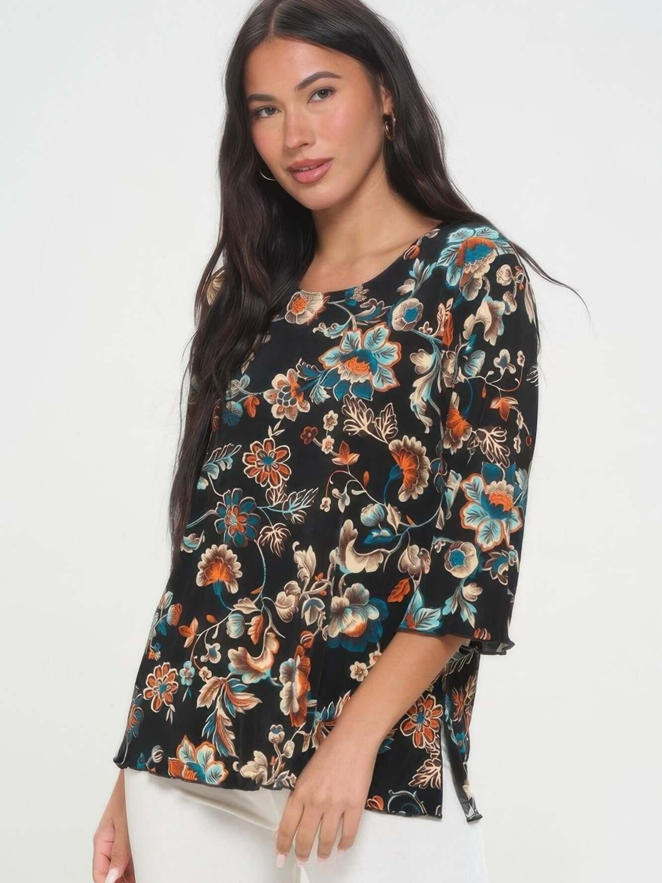 Print Quarter Sleeve Top featuring a stylish floral pattern and quarter sleeves on a model.
