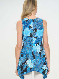 Woman wearing a blue floral Hit Print Shark Bite Hem Tank Top showcasing the back design.