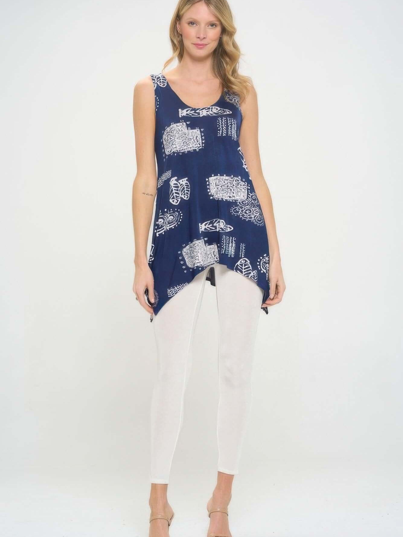 Hit Print Shark Bite Hem Tank Top showcasing vibrant blue print and stylish silhouette in a trendy outfit.