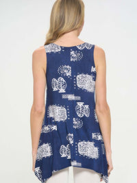 Model wearing the Hit Print Shark Bite Hem Tank Top showcasing its stylish back design and allover print.