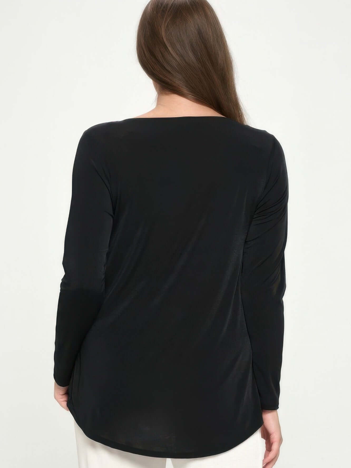 Back view of BNS high low top fashion, showcasing the soft stretch knit and long sleeves for modern style.