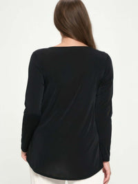 Back view of BNS high low top fashion, showcasing the soft stretch knit and long sleeves for modern style.