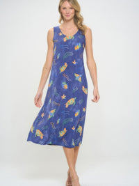 Model wearing a BNS Print Long Tank Dress featuring a vibrant sea life pattern on a blue background.