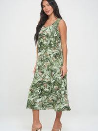 Model wearing a Bns Print Long Tank Dress, showcasing a green printed long tank dress with a stylish swirl pattern.