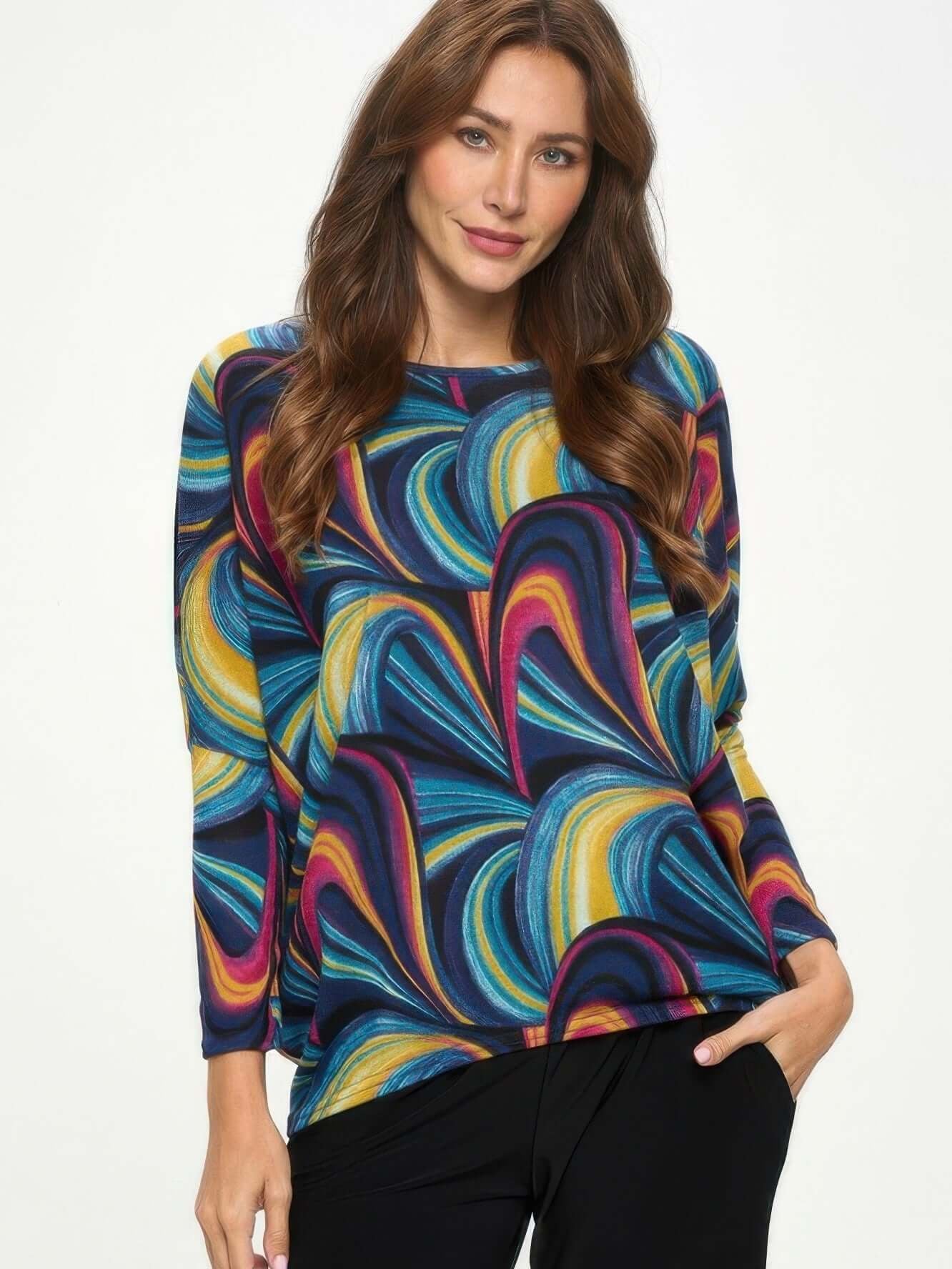 Mir batwing dolman top in vibrant swirl pattern, showcasing relaxed fit and wide dolman sleeves for women's fashion.