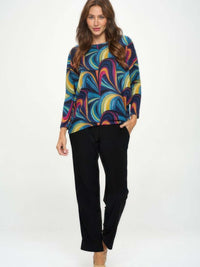 Mir batwing dolman top worn by a model, featuring vibrant colors and wide dolman sleeves for a relaxed fit.