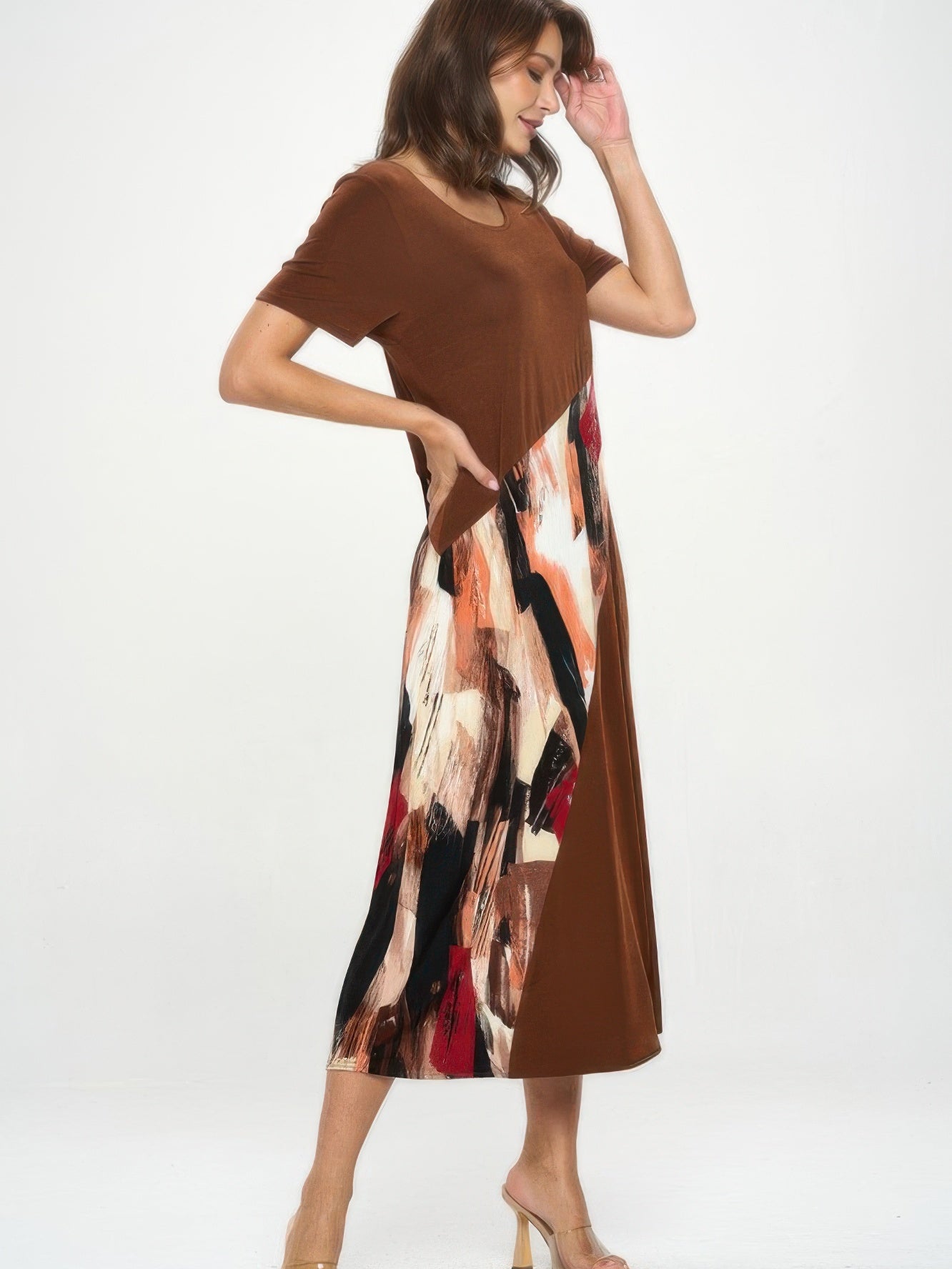 Model showcasing a BNS Contrast Maxi Dress with bold prints and solids, highlighting its stylish design.