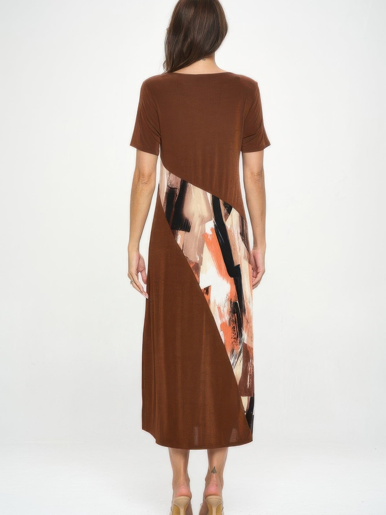 Back view of the BNS Contrast Maxi Dress showcasing its bold print and solid color design.