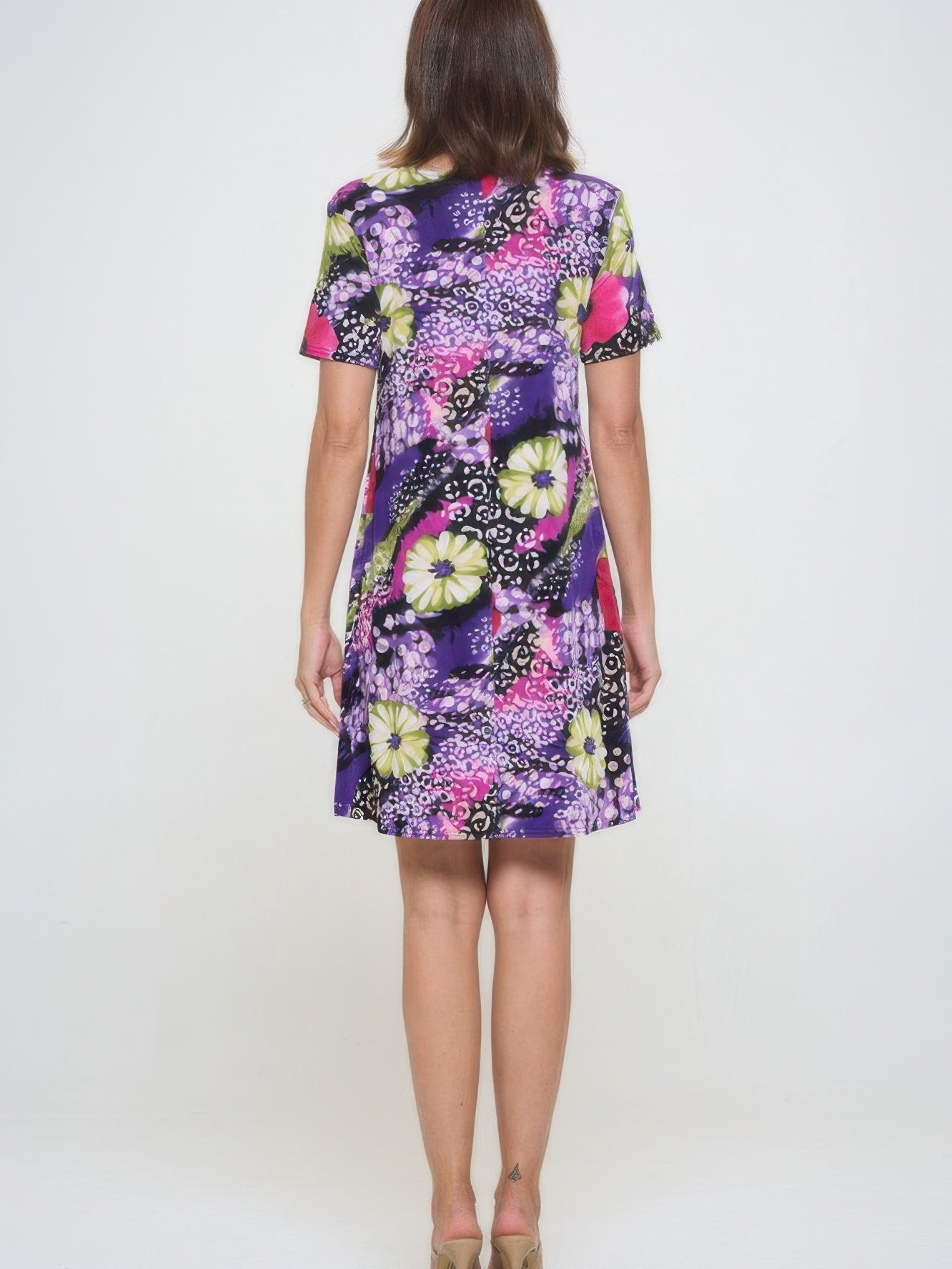 Plus Size Print Missy Dress Short Sleeve featuring a colorful floral pattern and short sleeves, shown from the back.