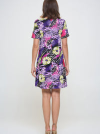 Plus Size Print Missy Dress Short Sleeve featuring a colorful floral pattern and short sleeves, shown from the back.