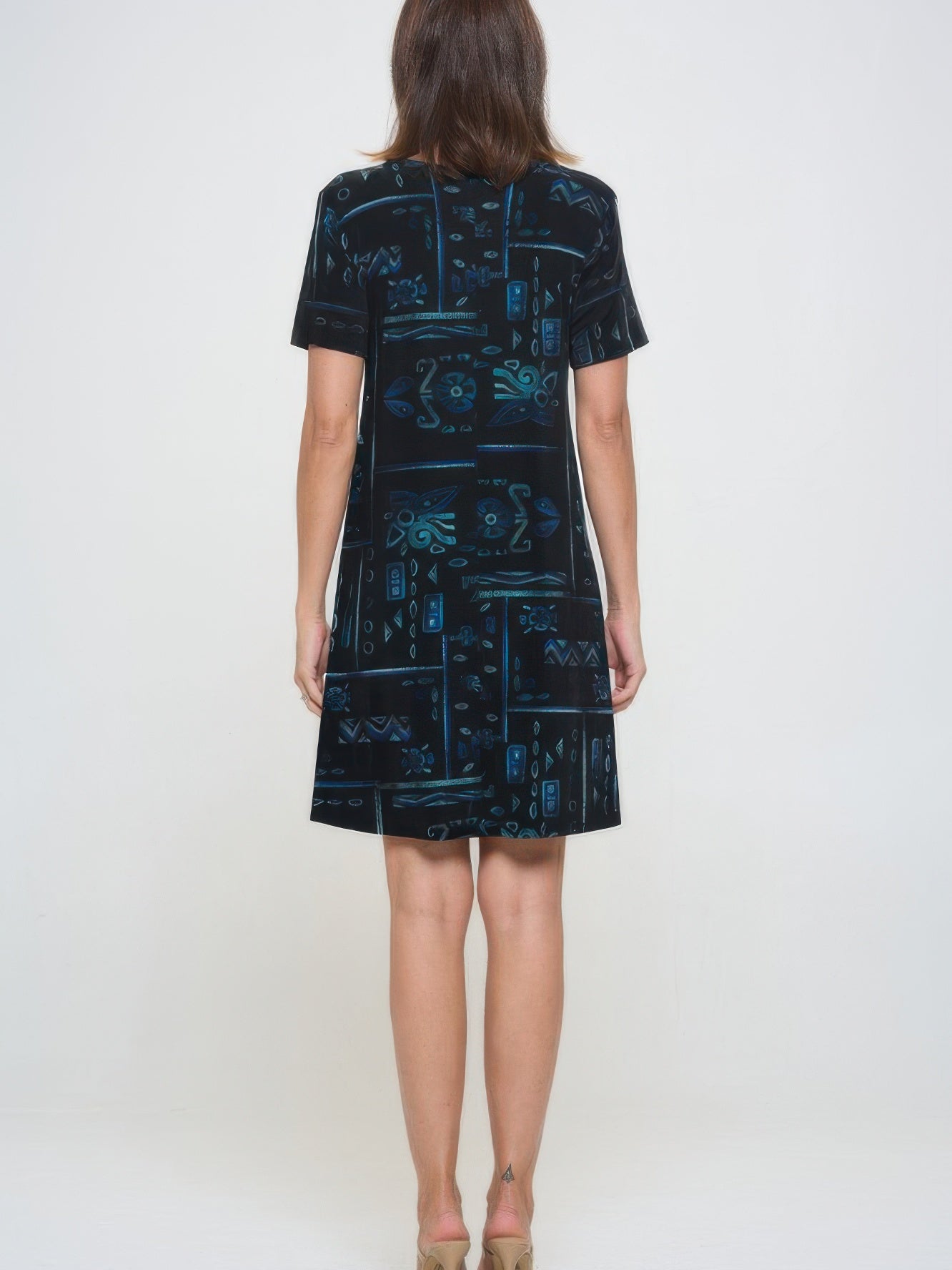 Plus size printed missy dress with short sleeves and a stylish print, viewed from the back.