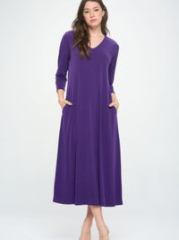 Hit V-neck long dress with pockets in purple, featuring a flattering silhouette and quarter sleeves.