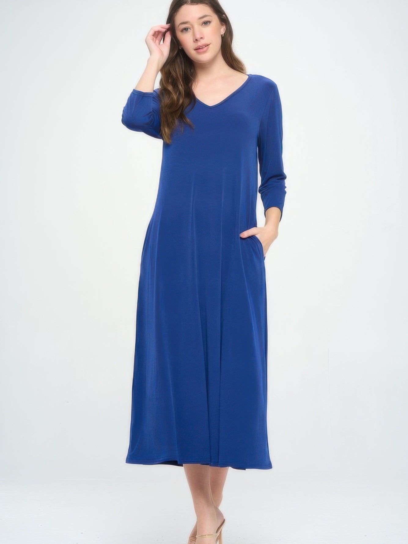 V-neck long dress with pockets in blue, featuring quarter sleeves and a flattering silhouette.