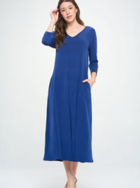 V-neck long dress with pockets in blue, featuring quarter sleeves and a flattering silhouette.