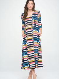 Hit V-neck long dress with pocket in a colorful striped pattern, featuring a fluid silhouette and stylish design.