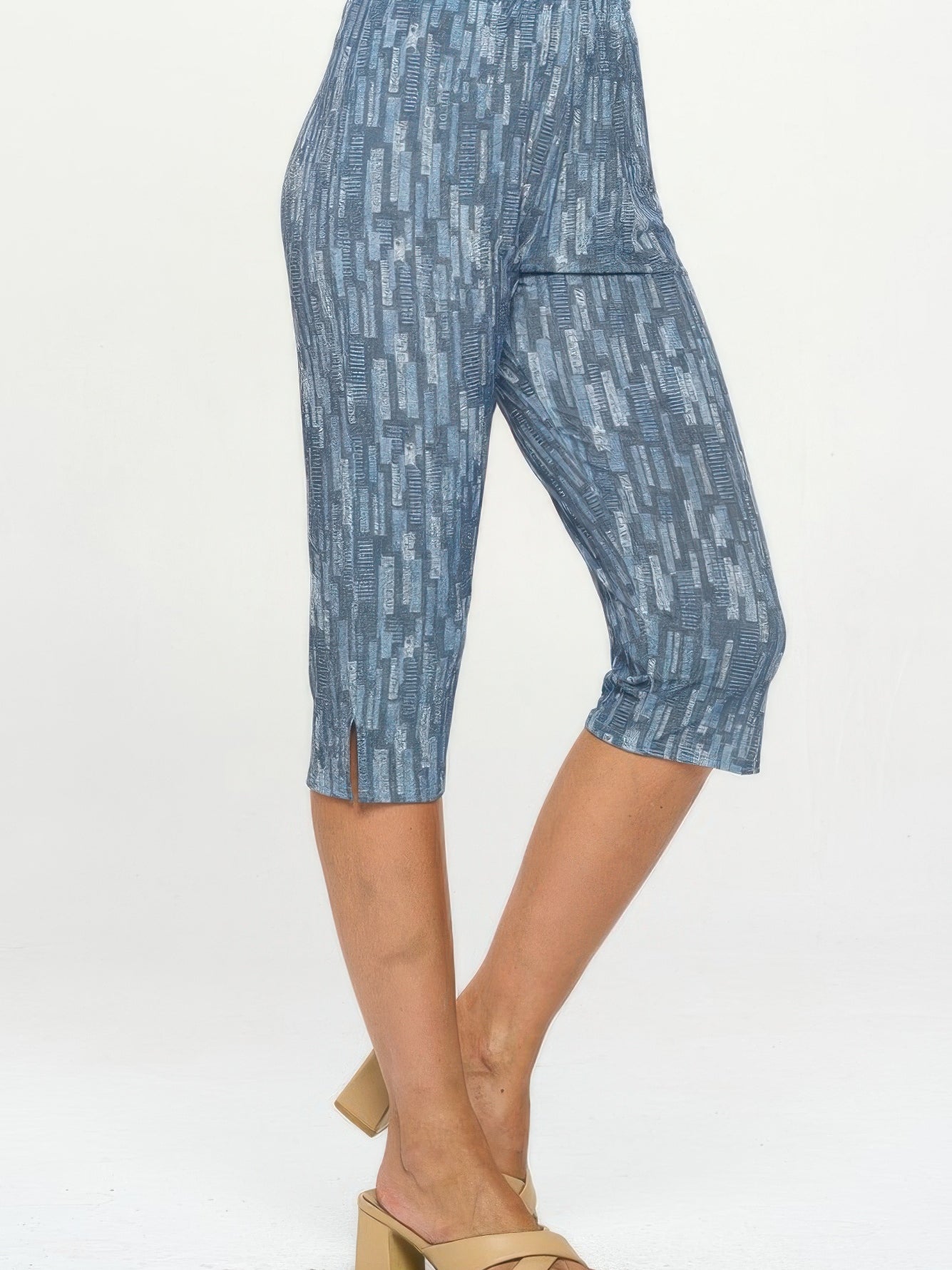 Comfortable capri pants in blue pattern, featuring an elastic waistband and stylish design for casual wear.