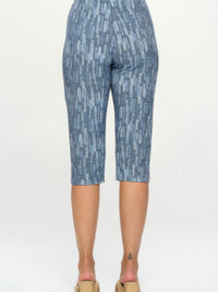 Comfortable capri pants in a stylish print, showcasing a flexible fit from the back view.