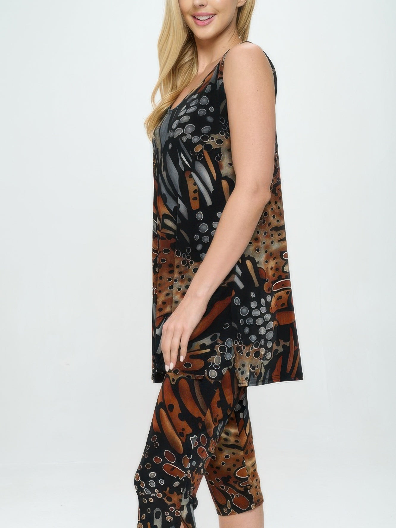 BNS Tank Capri Set showcased on model, featuring a sleeveless tank top and stylish capri pants in vibrant colors.