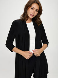 Hit Princess Jacket displayed on a model, featuring quarter sleeves and a softly draped front in sleek black.