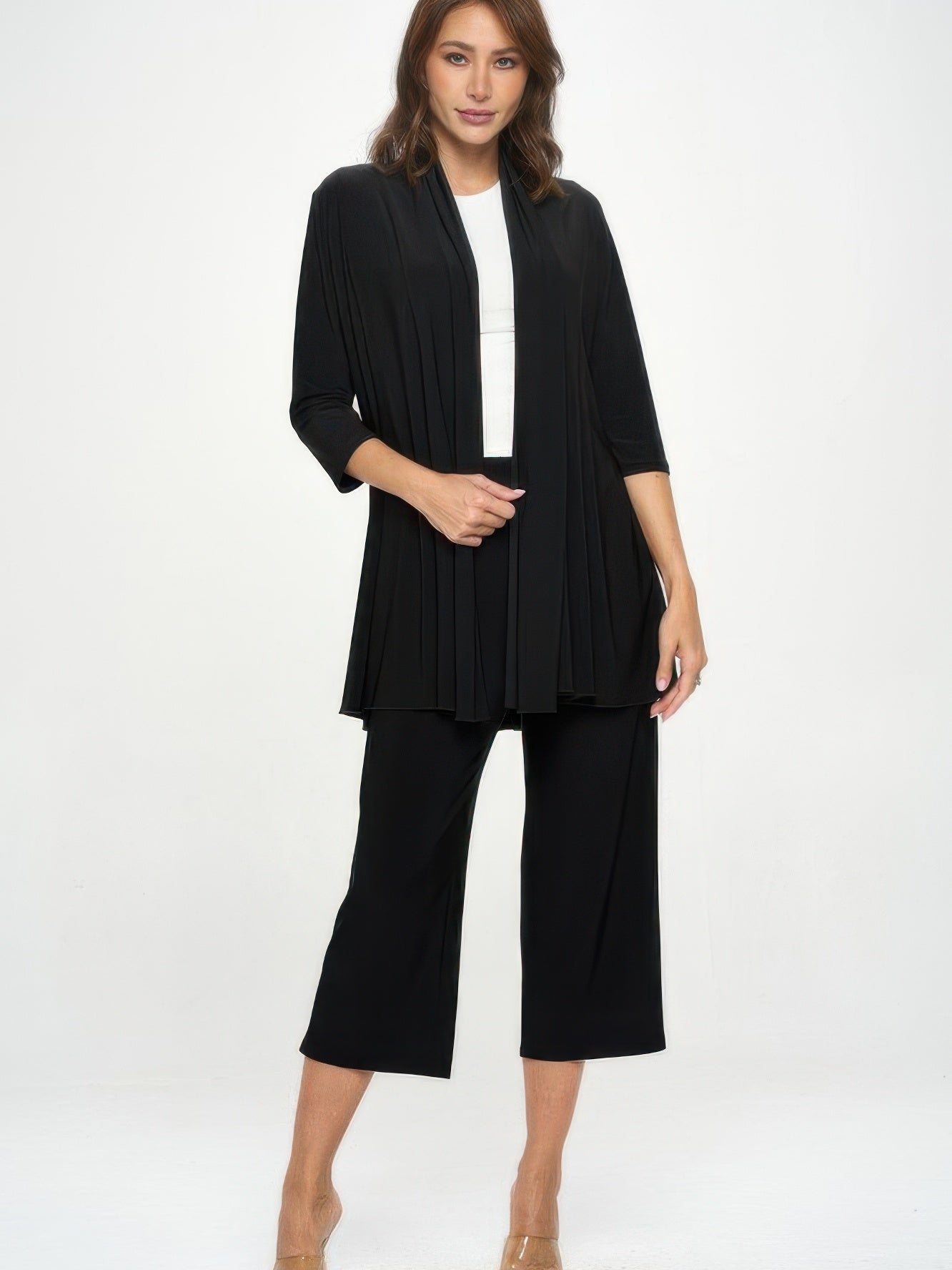 Model wearing the Hit Princess Jacket with quarter sleeves, paired with sleek black pants.