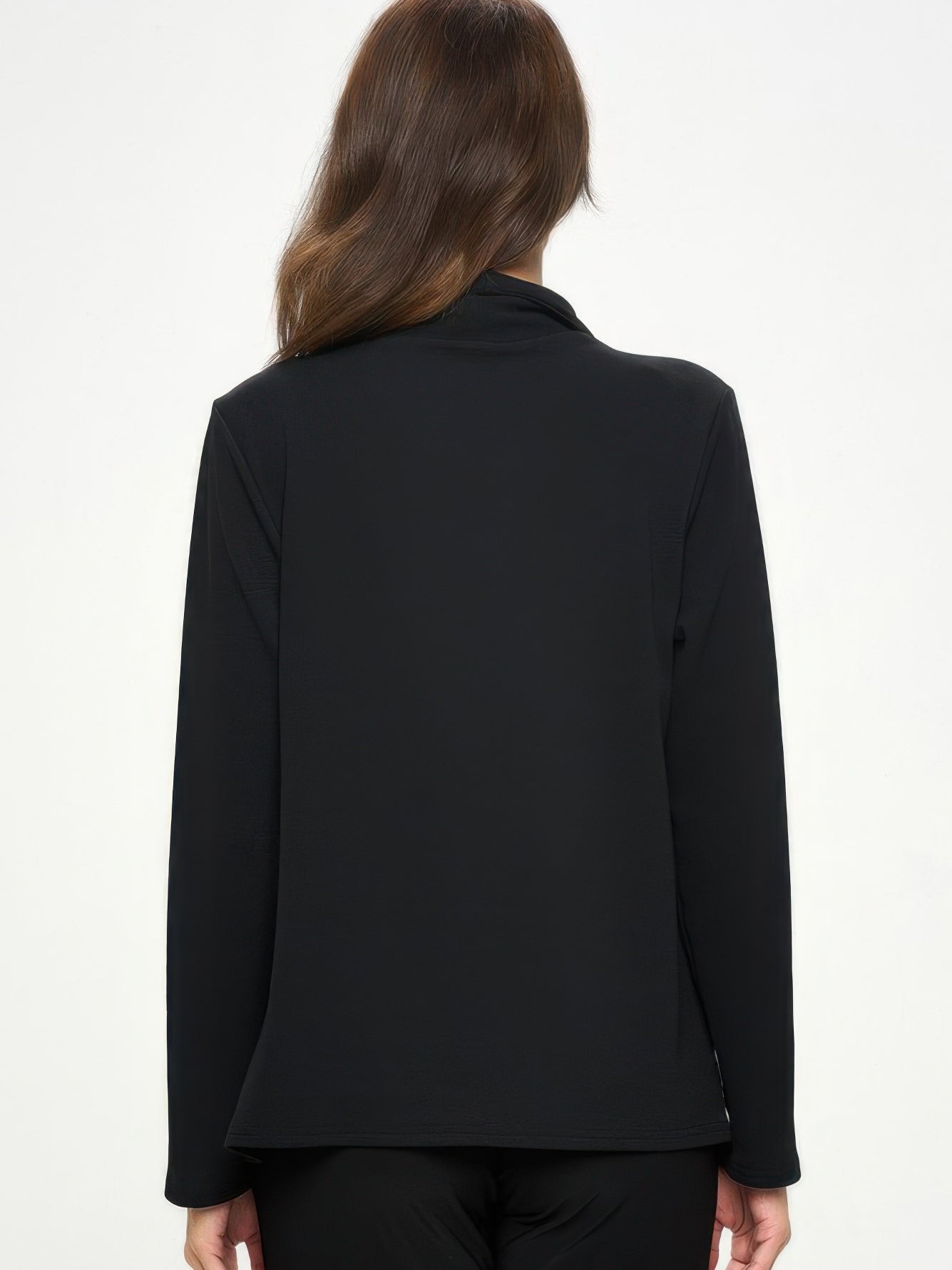 Back view of a woman wearing the Liverpool Front Drape Jacket in black, showcasing its refined and functional design.