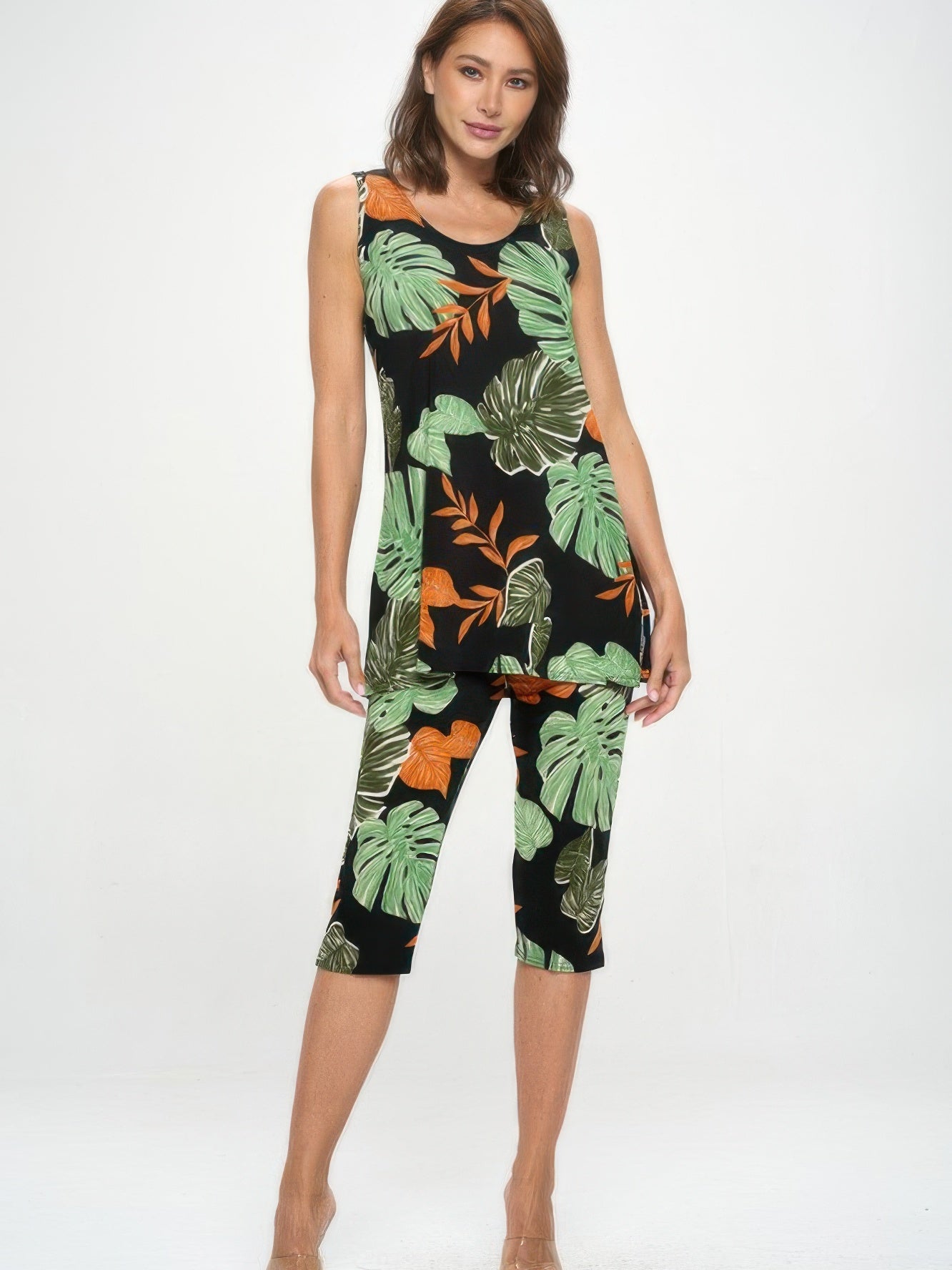 Model wearing Bns Tank Capri Pants Set featuring a sleeveless tank and Capri pants with tropical leaf patterns.