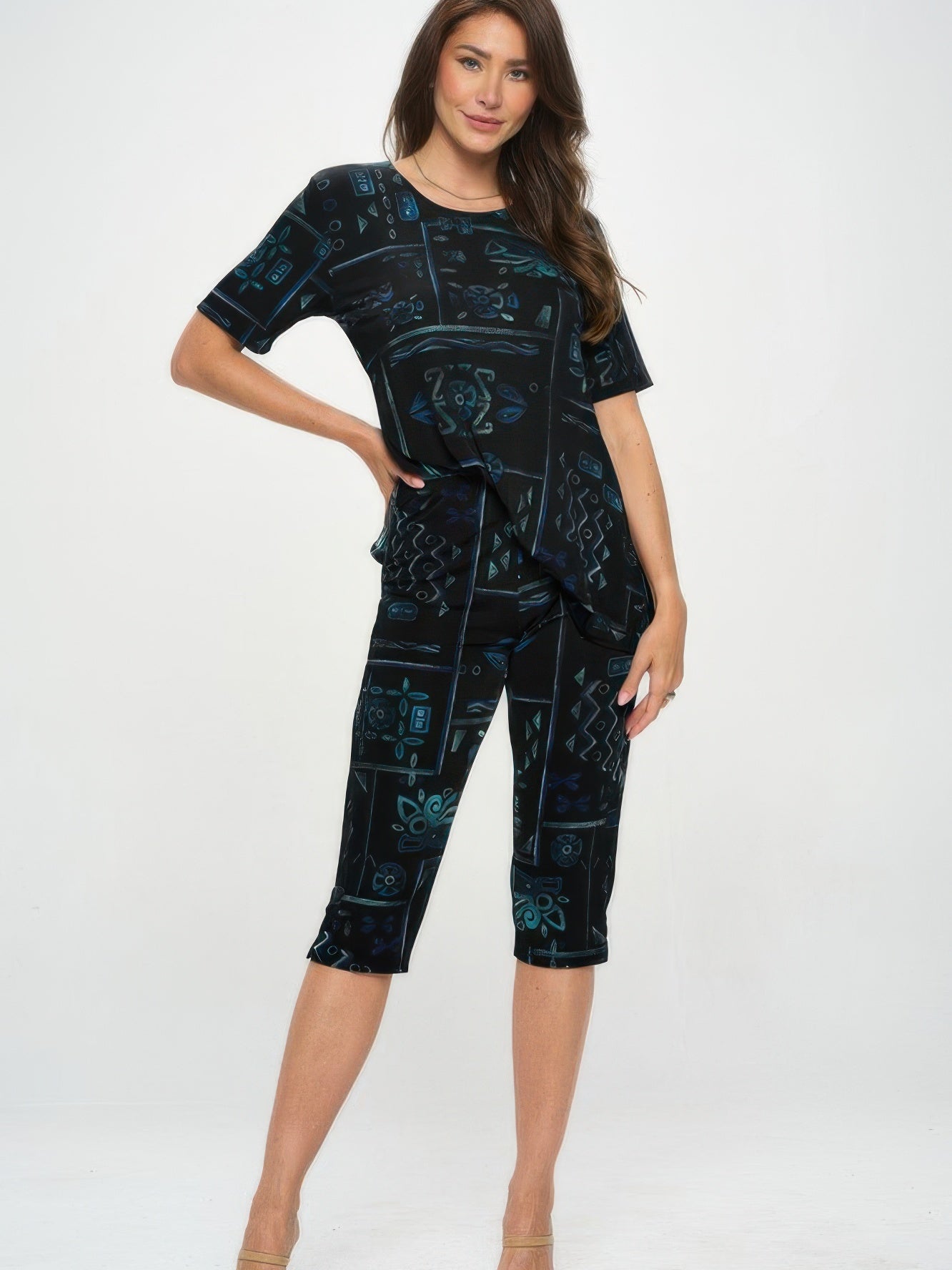 Model wearing Plus Size BNS Capri Pants Set featuring a printed top and matching capri pants.