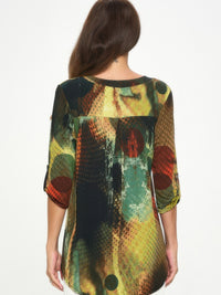 Back view of the Hit Notch Neck Rolled Sleeve Top featuring a unique colorful print and rolled sleeves.