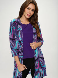 Mir Duster Jacket worn by model featuring abstract purple print and quarter sleeves for stylish comfort.