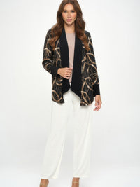 Glitter Long Sleeve Contrast Jacket worn by a model, featuring a black base with shimmering print panels.