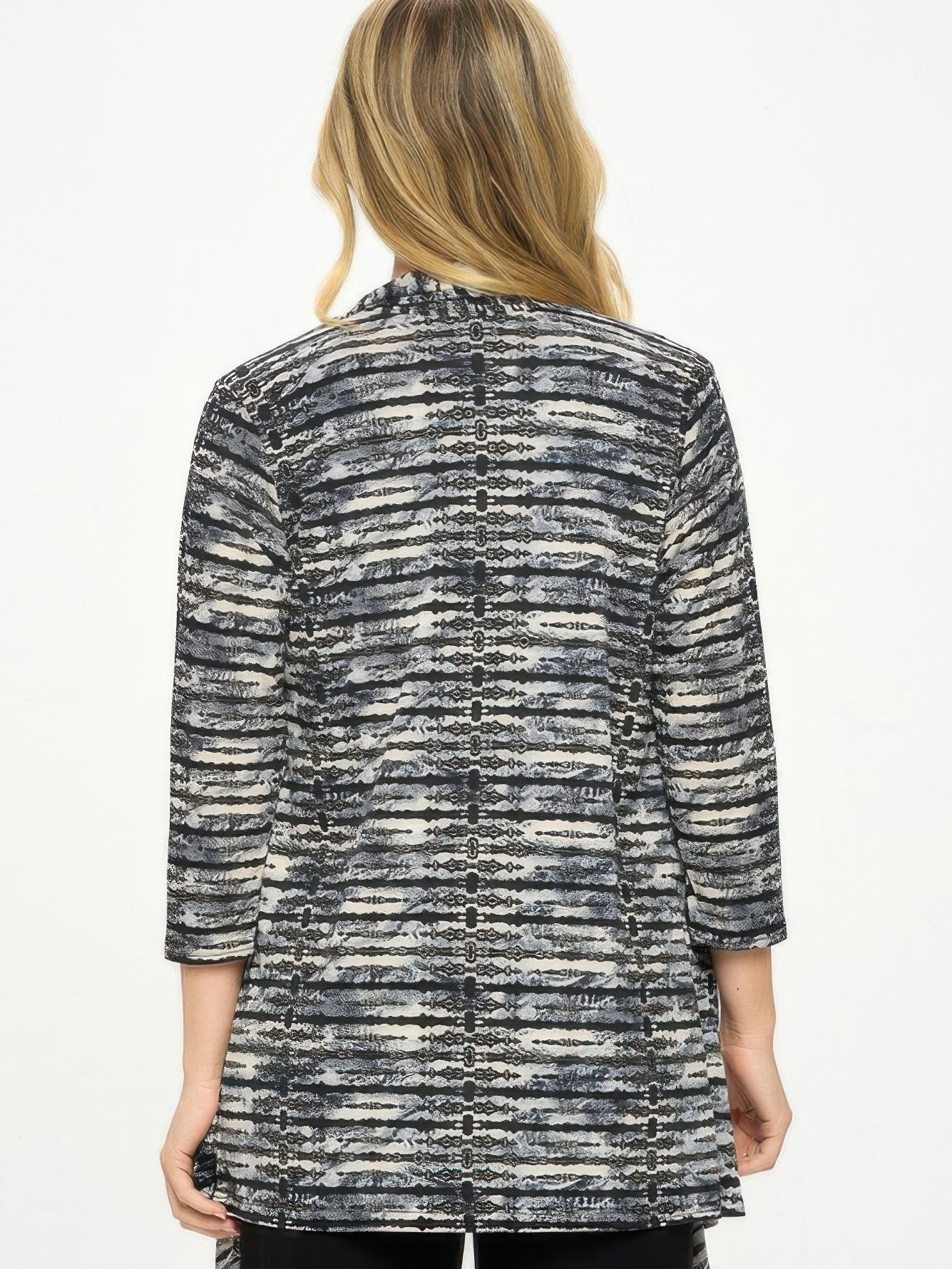 Back view of the ITY Draped Wrap Jacket showcasing its dynamic printed design and quarter-sleeve style.