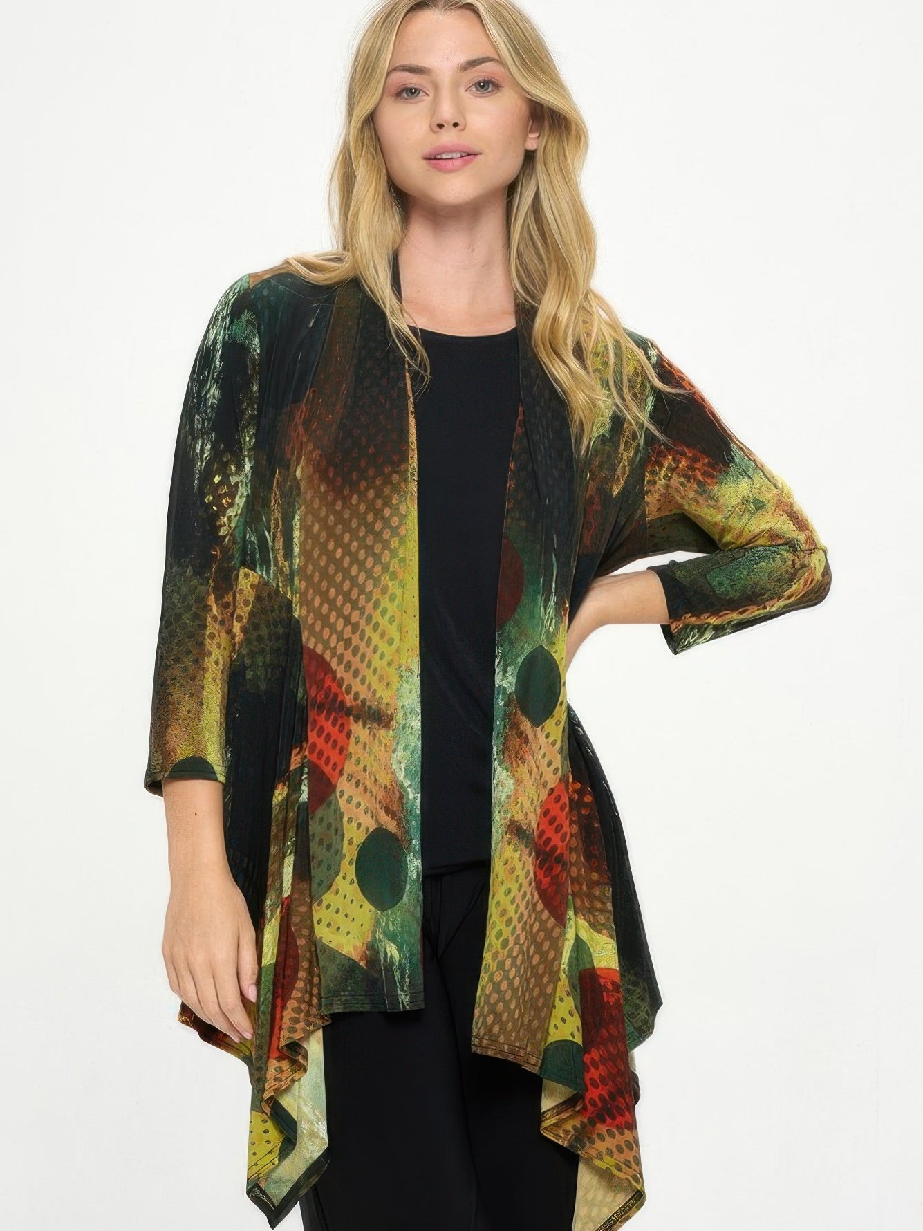 Woman wearing ITY Draped Wrap Jacket with colorful printed design, perfect for stylish layering.