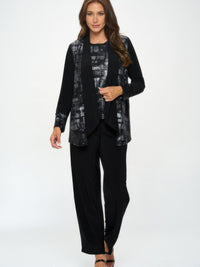 Model wearing a Nylon Foil Sequin Contrast Jacket with black pants and strappy heels, showcasing a chic and modern look.