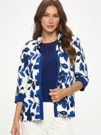 Damboru Print Contrast Jacket showcasing blue Magnolia print on elegant fabric with navy accents.