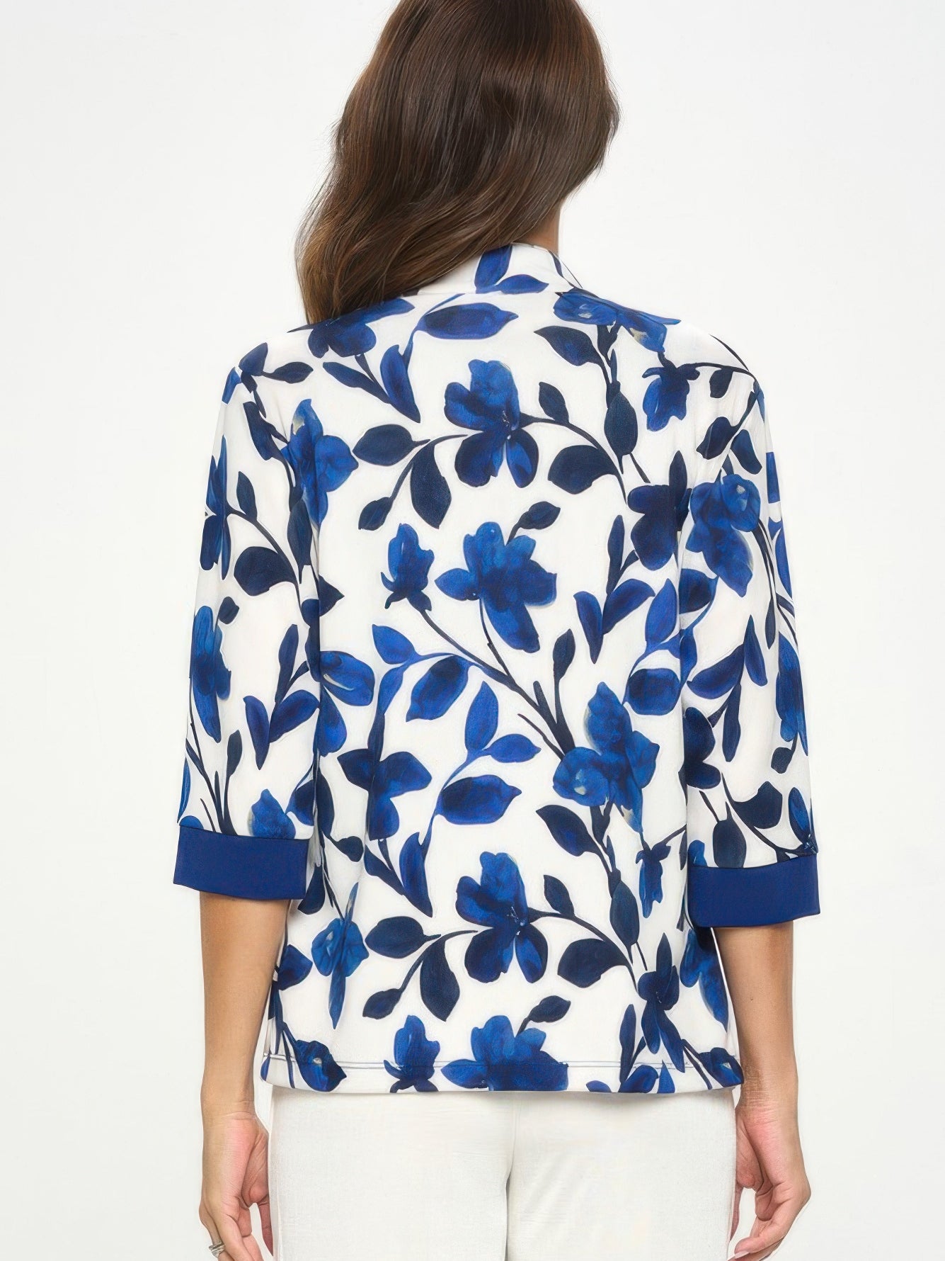 Back view of a Damboru Print Contrast Jacket featuring a blue Magnolia floral design.