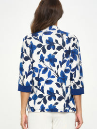 Back view of a Damboru Print Contrast Jacket featuring a blue Magnolia floral design.
