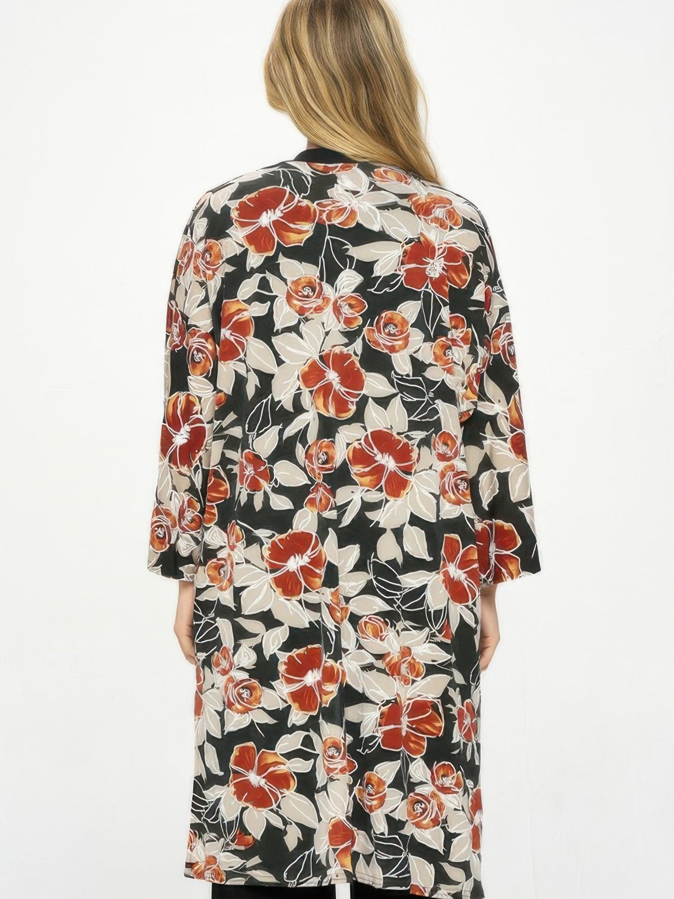 Woman wearing Hit Kimono Long Jacket With Pocket, showcasing floral design and relaxed fit from the back.