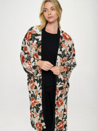Hit Kimono Long Jacket With Pocket featuring a floral design, relaxed silhouette, and side seam pockets.